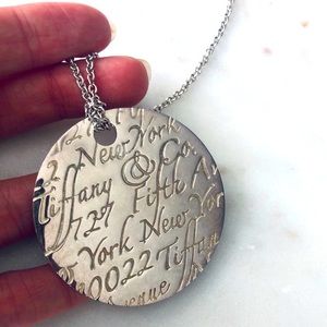 TIFFANY & CO. LARGE NOTES ROUND PENDANT NECKLACE